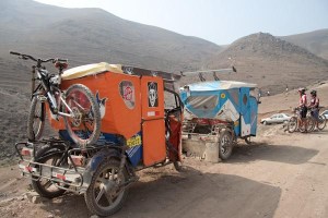 "taxis" taking mountain bikes up to a competition